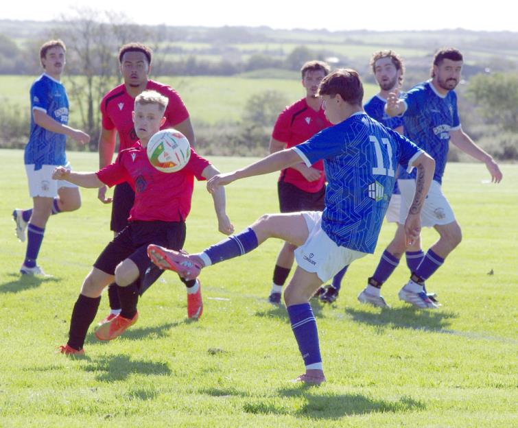 Action from Camrose where the home side dramatically came from behind to beat West Wales Premier Clase Social in extra time. Picture Gordon Thomas
